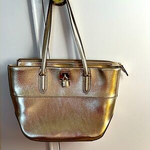 New Nine West man-made light bronze metallic bag. No tags. Great quality